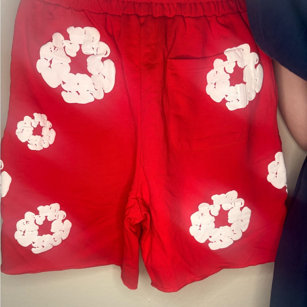 Red Shorts with White Floral Pattern